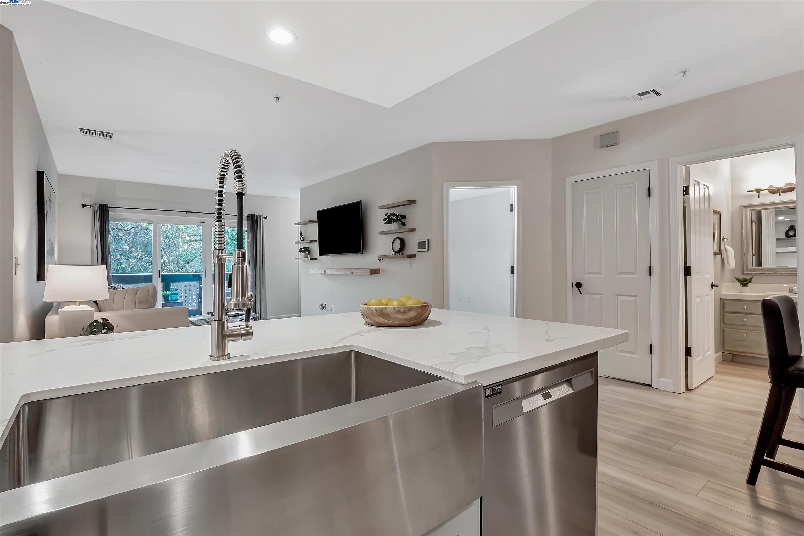Undisclosed Address San Ramon, CA 94583 - Photo 23 of 40 a kitchen with a sink and a refrigerator