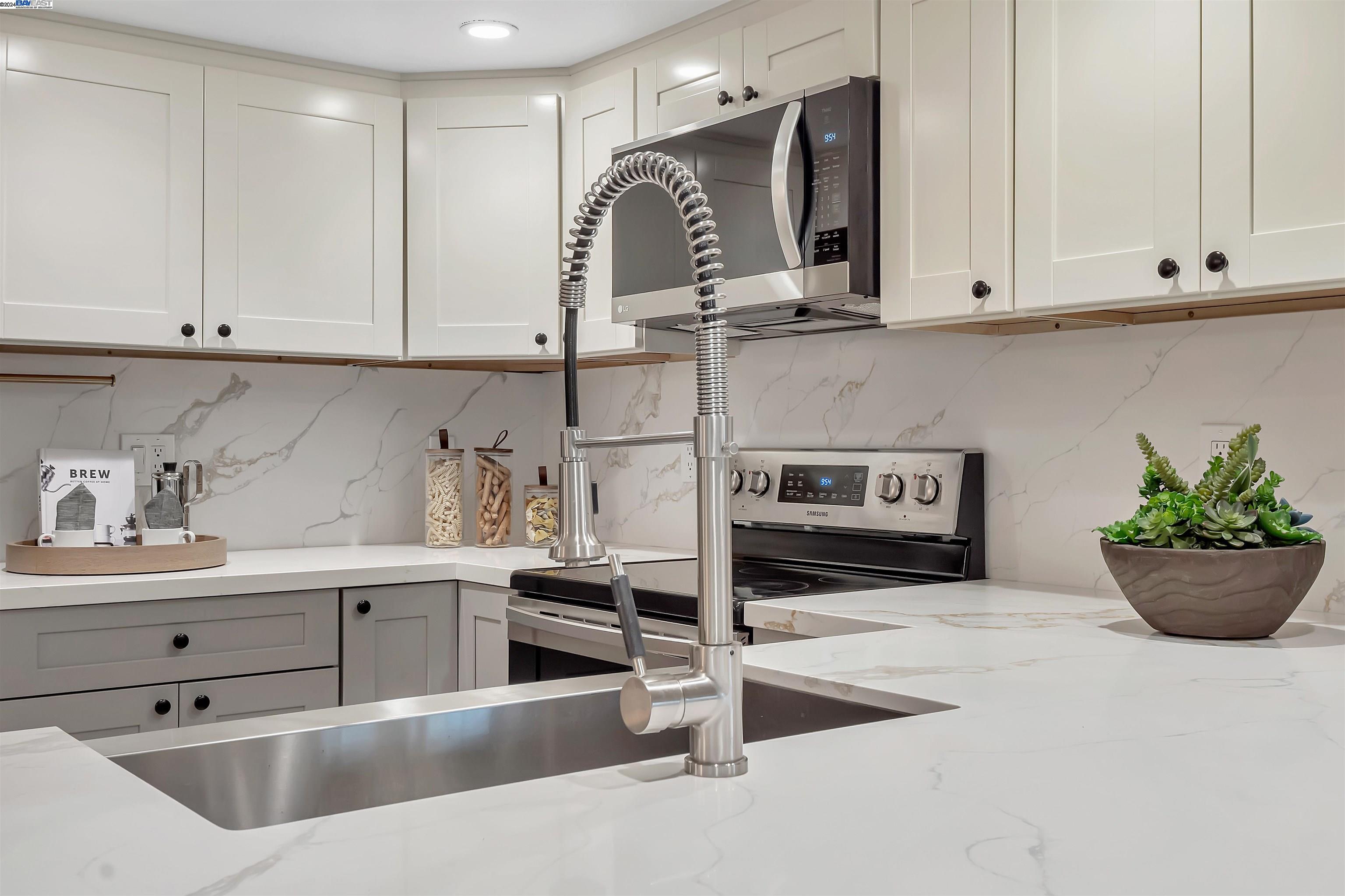 Undisclosed Address San Ramon, CA 94583 - Photo 24 of 40 a kitchen with stainless steel appliances granite countertop a sink and a stove