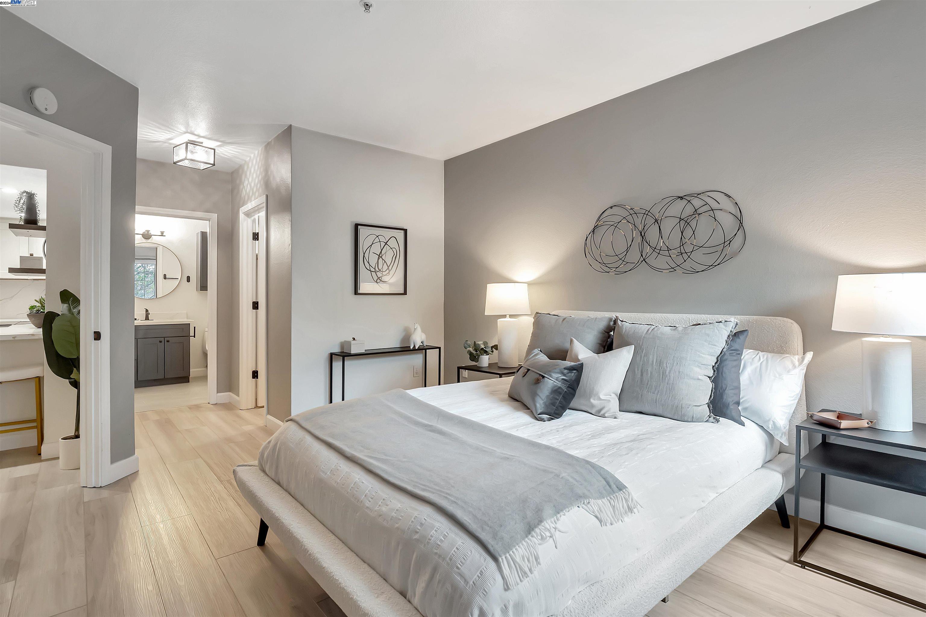 Undisclosed Address San Ramon, CA 94583 - Photo 28 of 40 a bedroom with a bed and a table in it