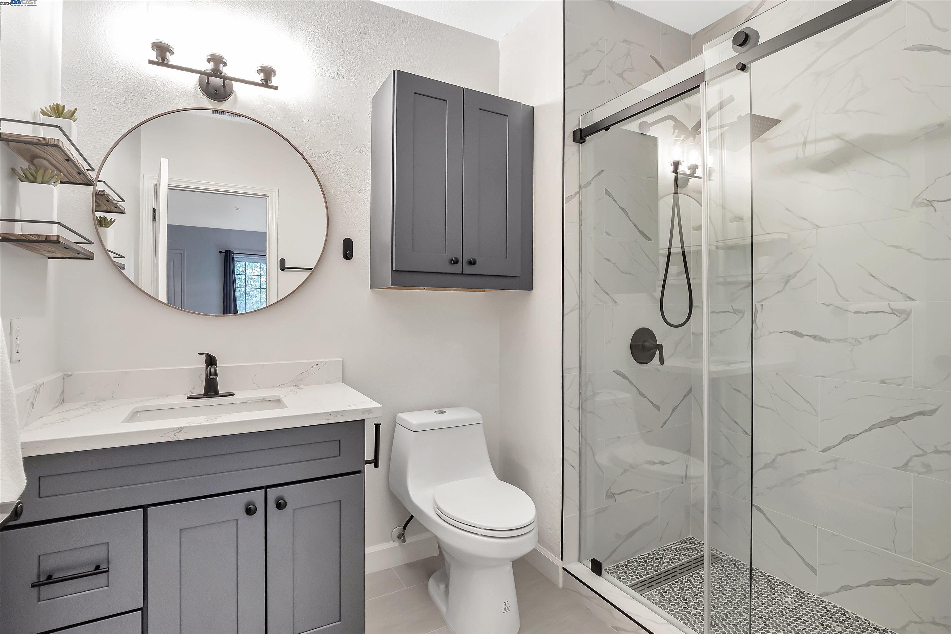 Undisclosed Address San Ramon, CA 94583 - Photo 29 of 40 a bathroom with a toilet sink and shower