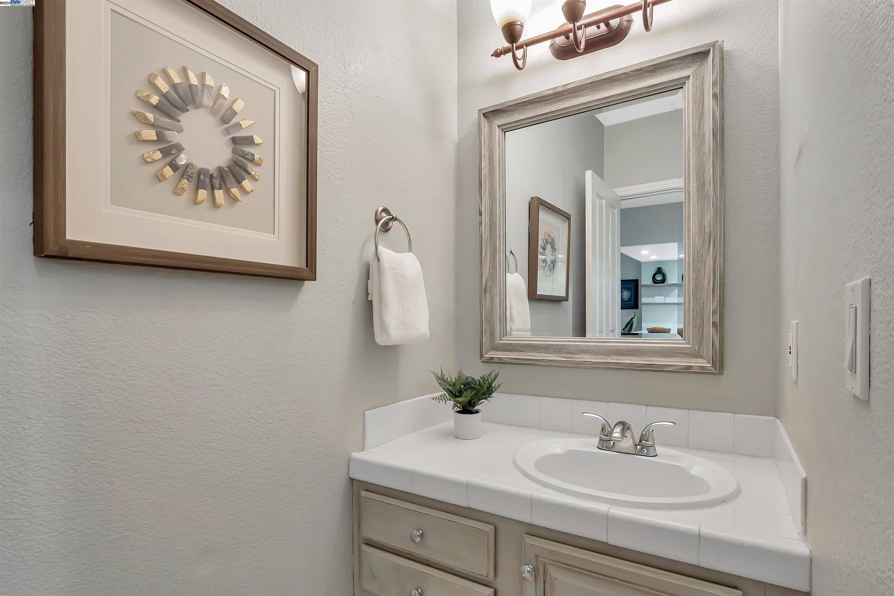 Undisclosed Address San Ramon, CA 94583 - Photo 34 of 40 a bathroom with a sink and a mirror