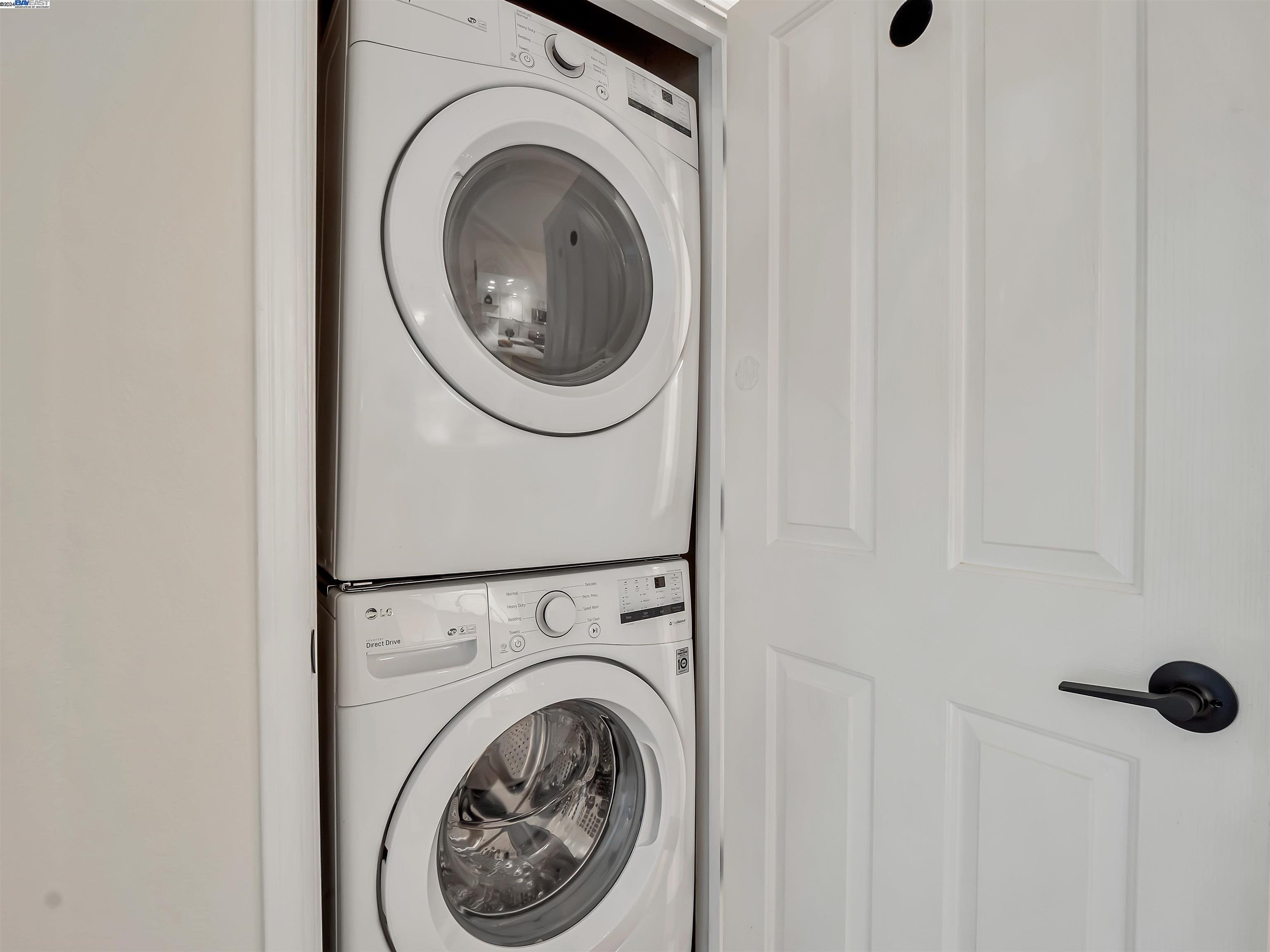 Undisclosed Address San Ramon, CA 94583 - Photo 38 of 40 a view of a hallway with washer and dryer