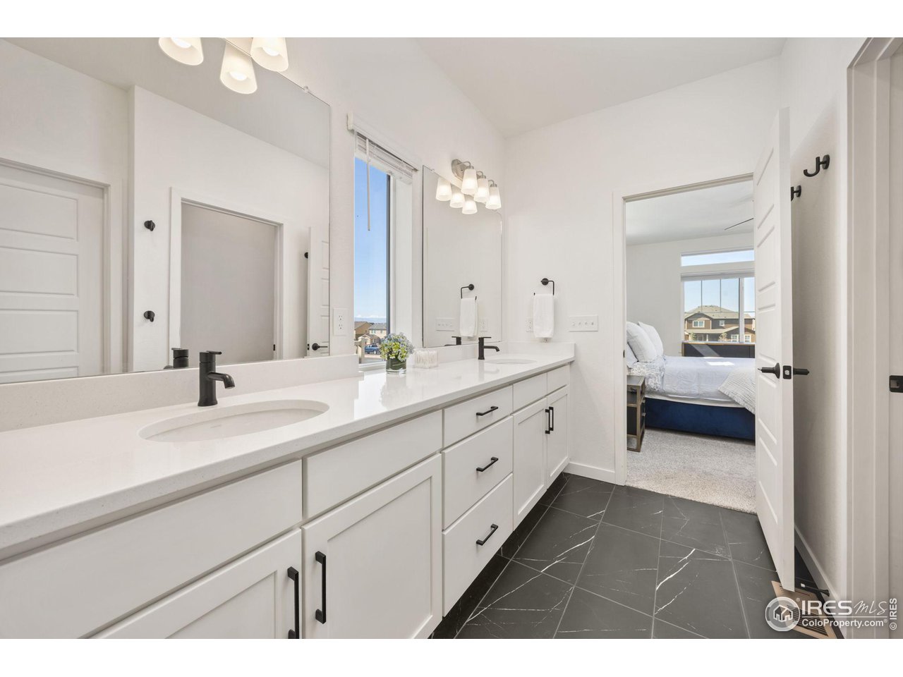 1059 Larkspur Drive Erie, CO 80516 - Photo 15 of 40 oversized double vanity for all of your storage needs