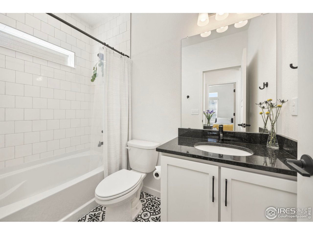 1059 Larkspur Drive Erie, CO 80516 - Photo 18 of 40 Main floor guest bathroom