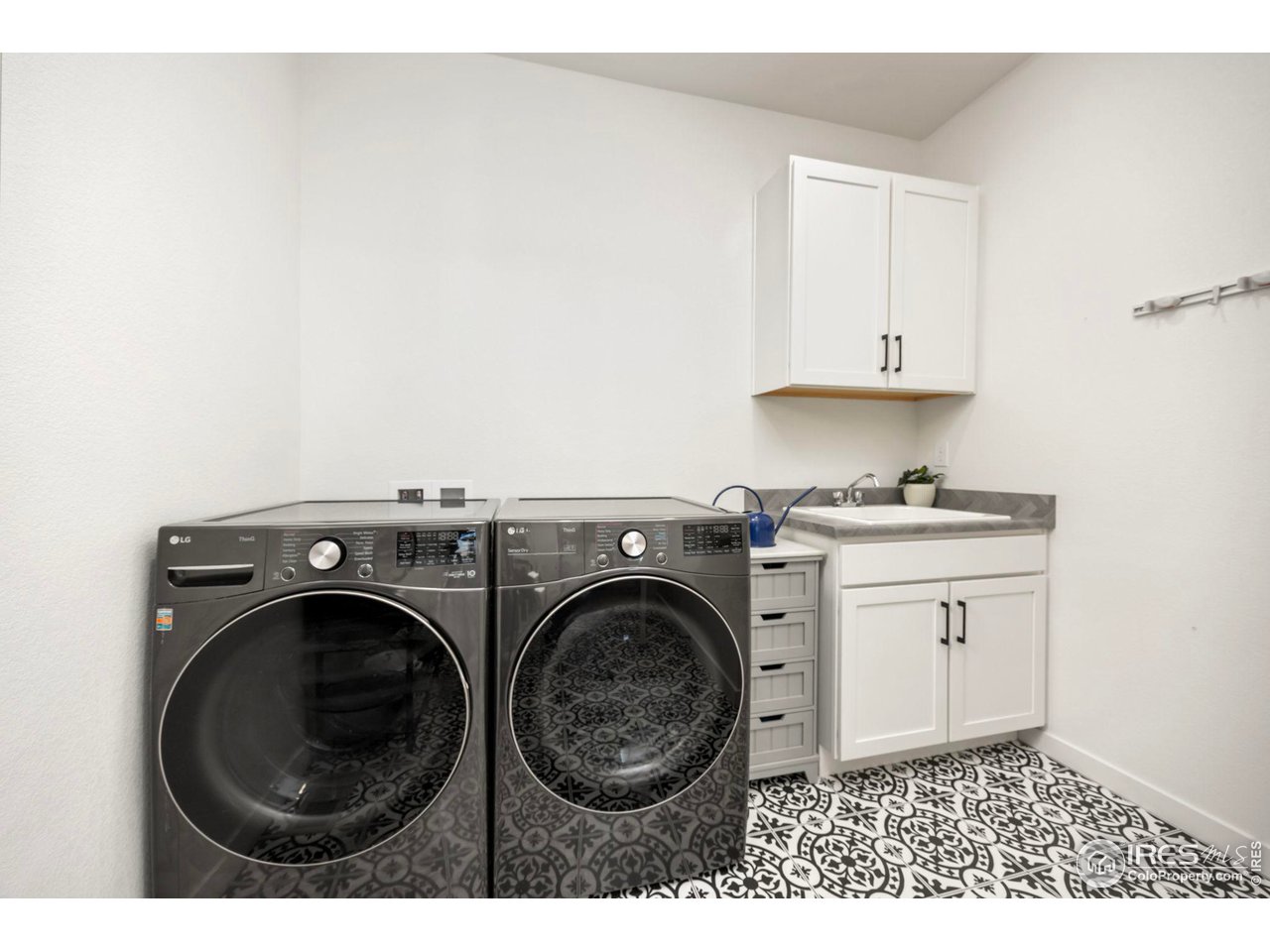 1059 Larkspur Drive Erie, CO 80516 - Photo 19 of 40 Oversized main floor laundry room