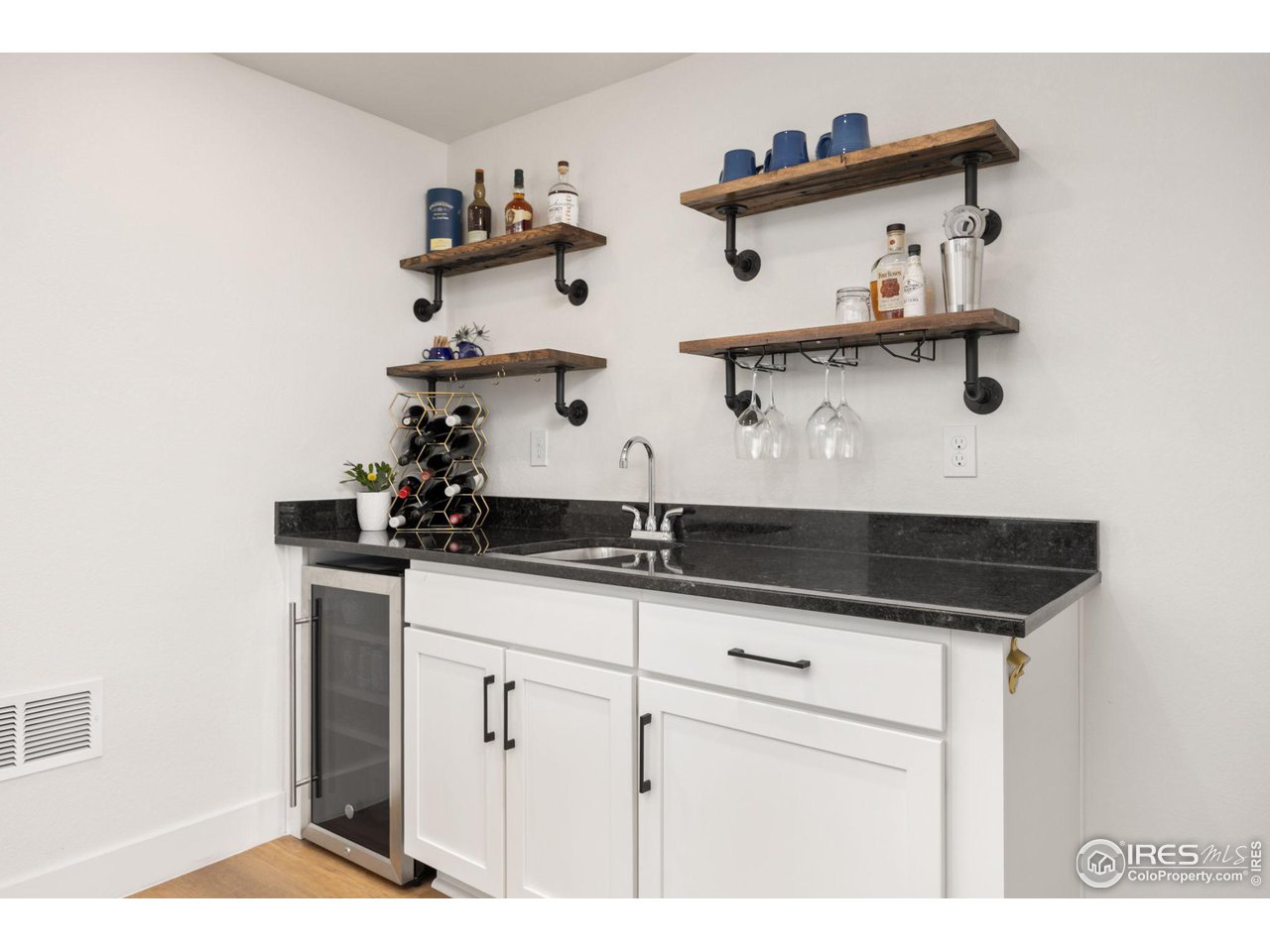 1059 Larkspur Drive Erie, CO 80516 - Photo 25 of 40 Downstairs bar area
