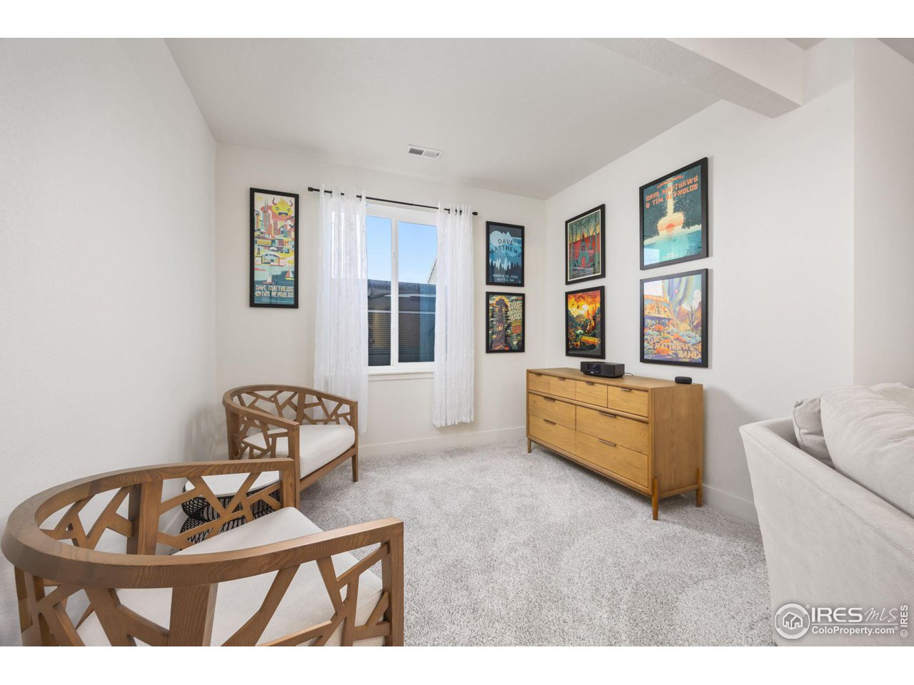 1059 Larkspur Drive Erie, CO 80516 - Photo 26 of 40 Downstairs sitting area