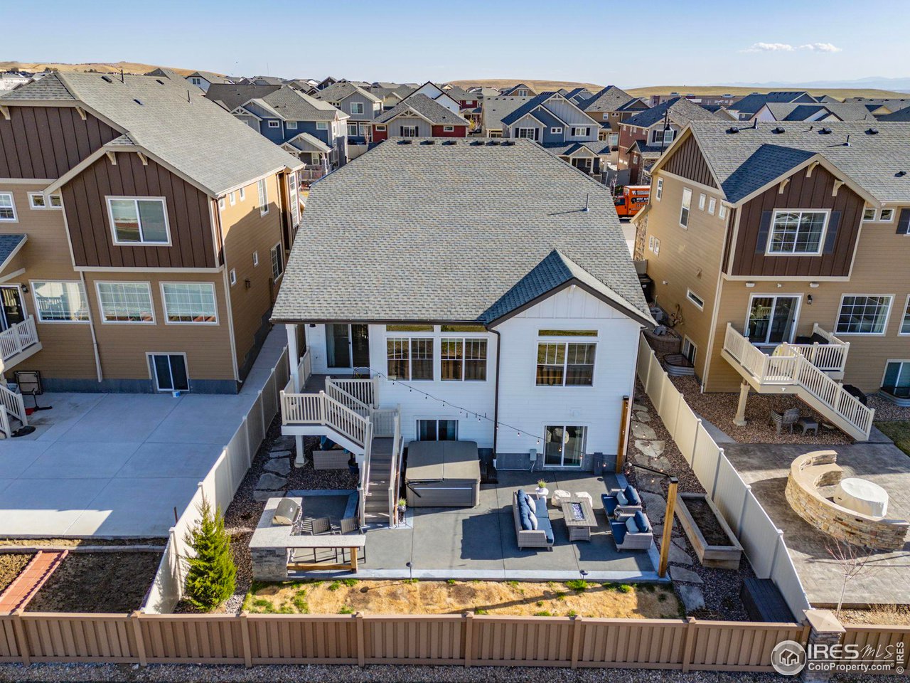 1059 Larkspur Drive Erie, CO 80516 - Photo 31 of 40 luxury backyard with outdoor grill and hot tub!