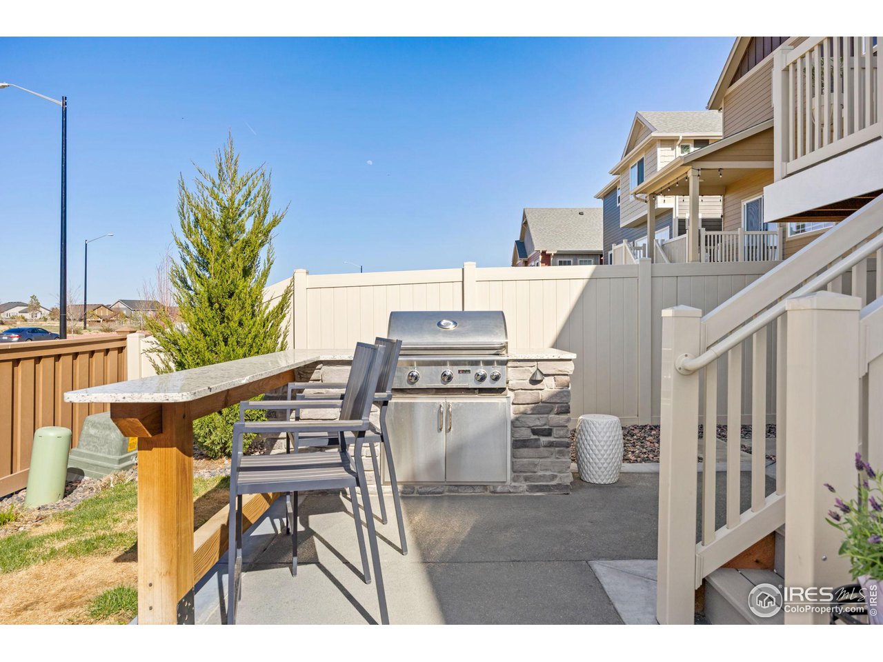 1059 Larkspur Drive Erie, CO 80516 - Photo 33 of 40 outdoor grill and bar area.