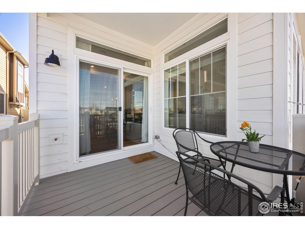 1059 Larkspur Drive Erie, CO 80516 - Photo 35 of 40 Charming deck off dining room