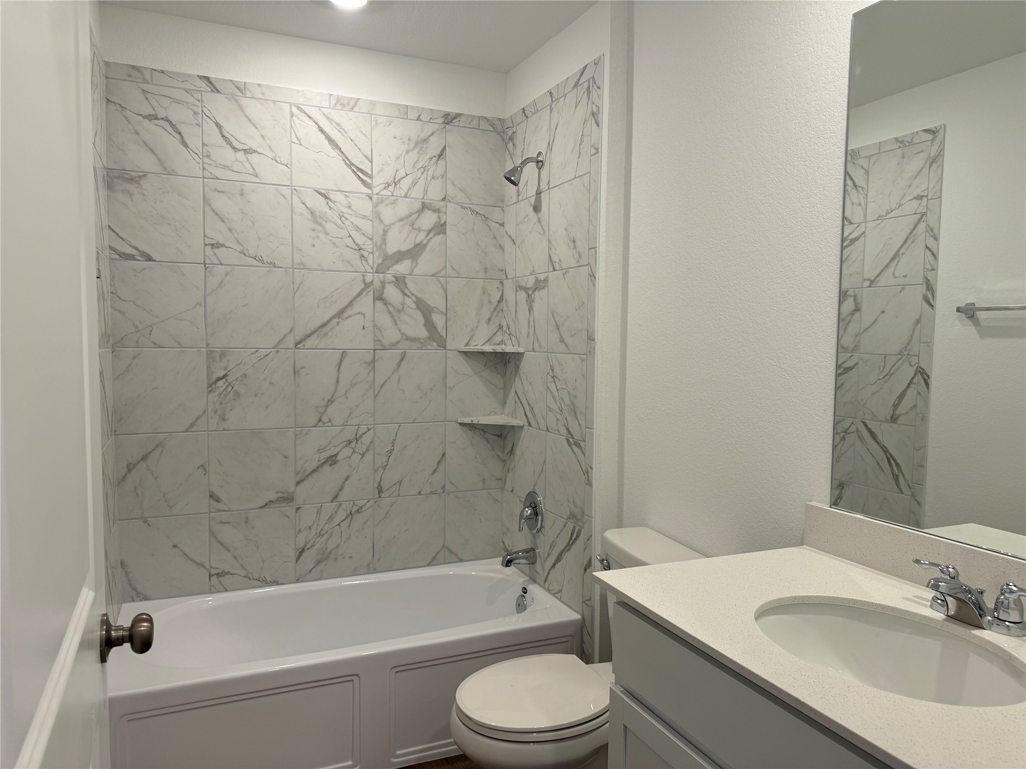 176 Mayacama Loop San Marcos, TX 78666 - Photo 12 of 21 a bathroom with a sink toilet bathtub and shower