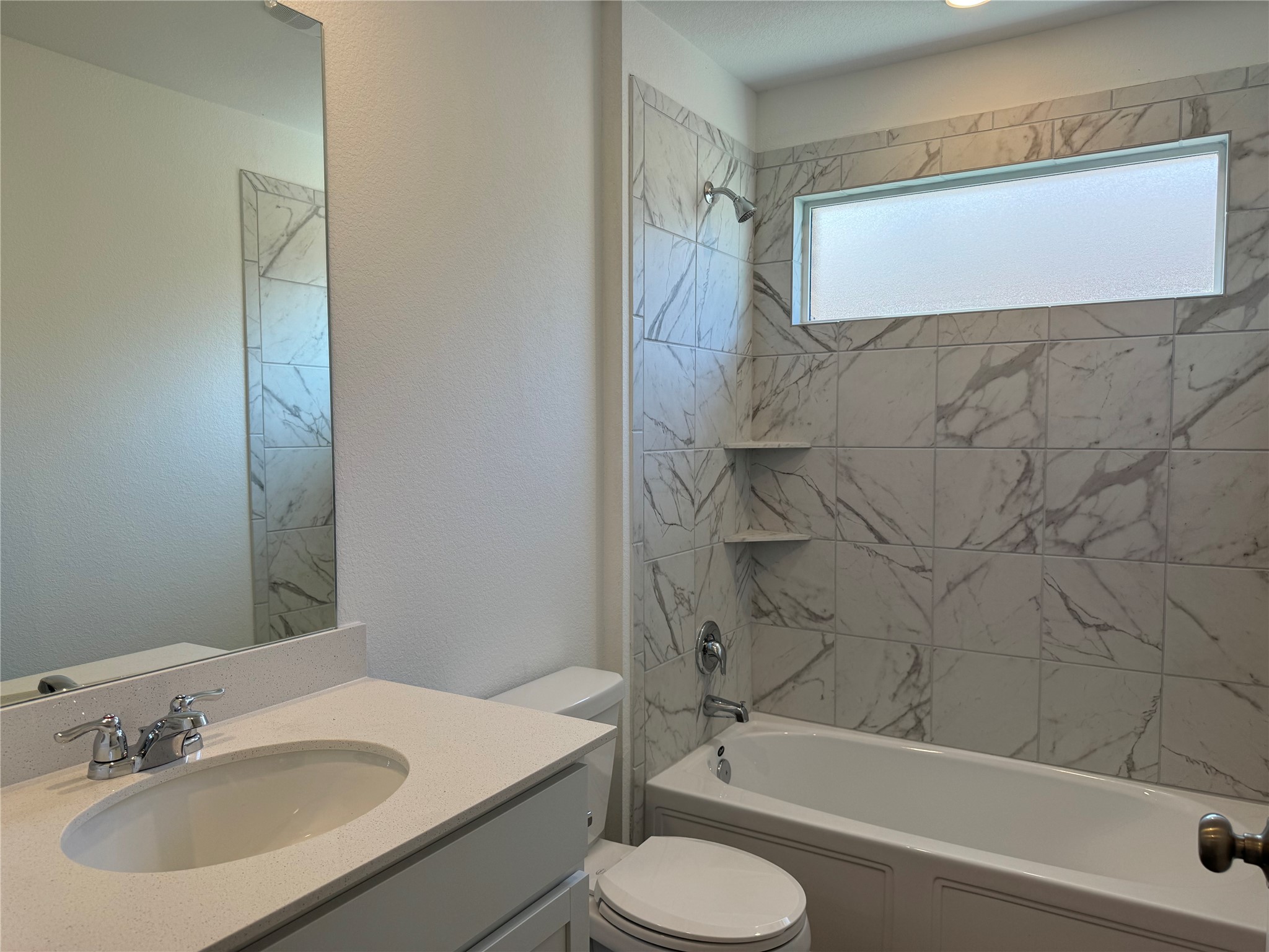 176 Mayacama Loop San Marcos, TX 78666 - Photo 15 of 21 a bathroom with a sink toilet and a bathtub