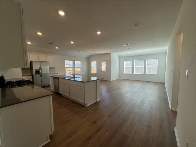 a view of swimming pool with seating area