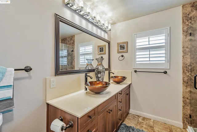a kitchen with a sink and a window