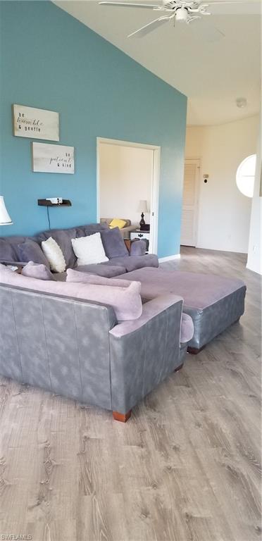 81 Silver Oaks Circle, Unit 7204 Naples, FL 34119 - Photo 19 of 33 a bedroom with bed and window