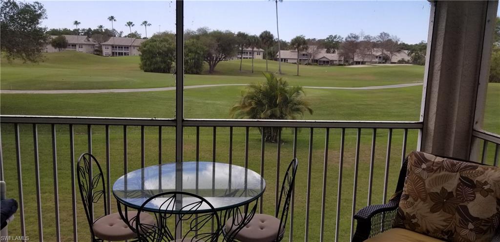 81 Silver Oaks Circle, Unit 7204 Naples, FL 34119 - Photo 29 of 33 a view of a balcony with lake view