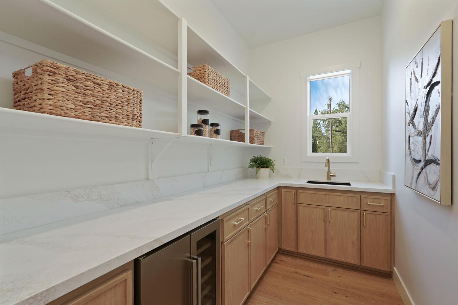 4177 Laird Road Loomis, CA 95650 - Photo 18 of 62 a kitchen with a sink and cabinets