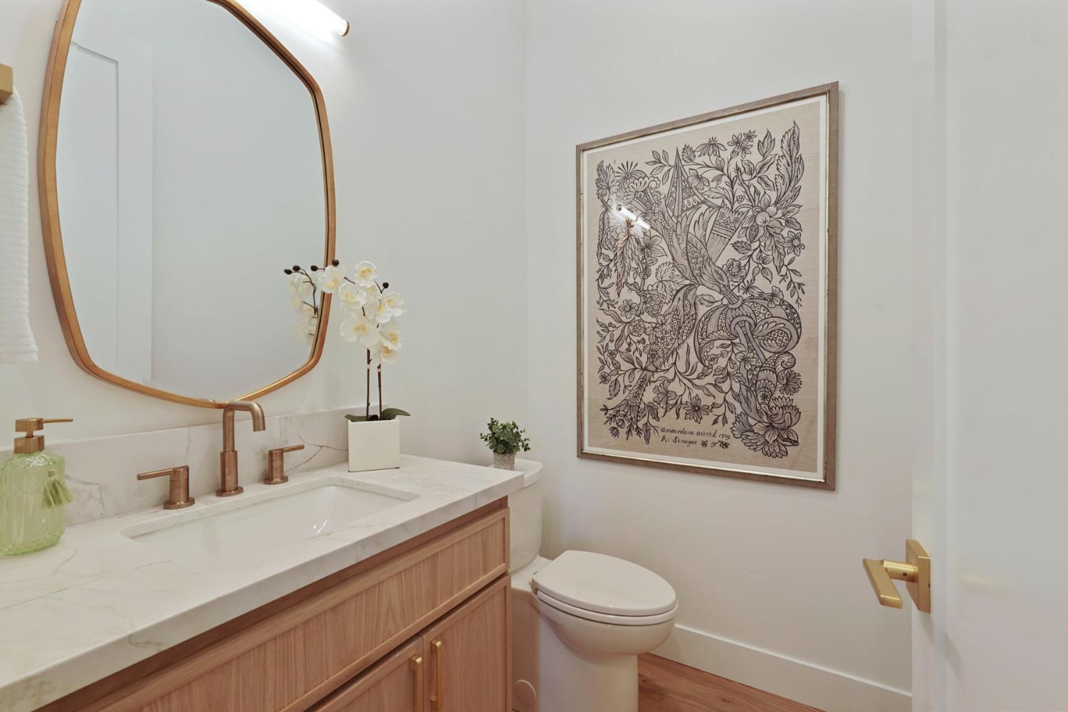 4177 Laird Road Loomis, CA 95650 - Photo 22 of 62 a bathroom with a sink mirror vanity and toilet