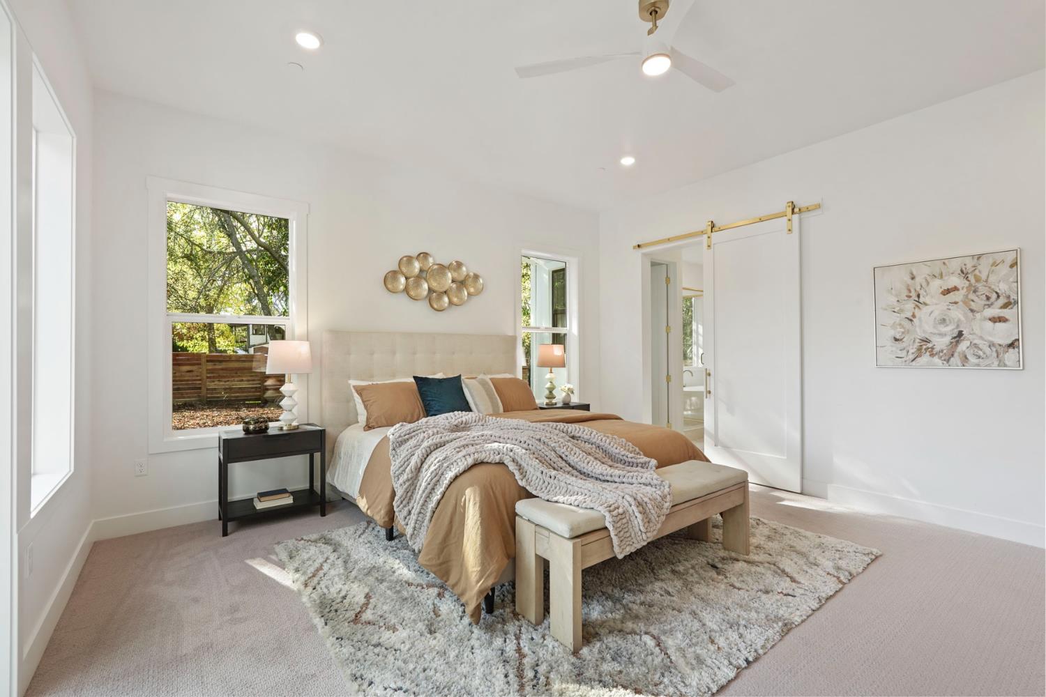 4177 Laird Road Loomis, CA 95650 - Photo 24 of 62 a bedroom with a bed and a painting on the wall