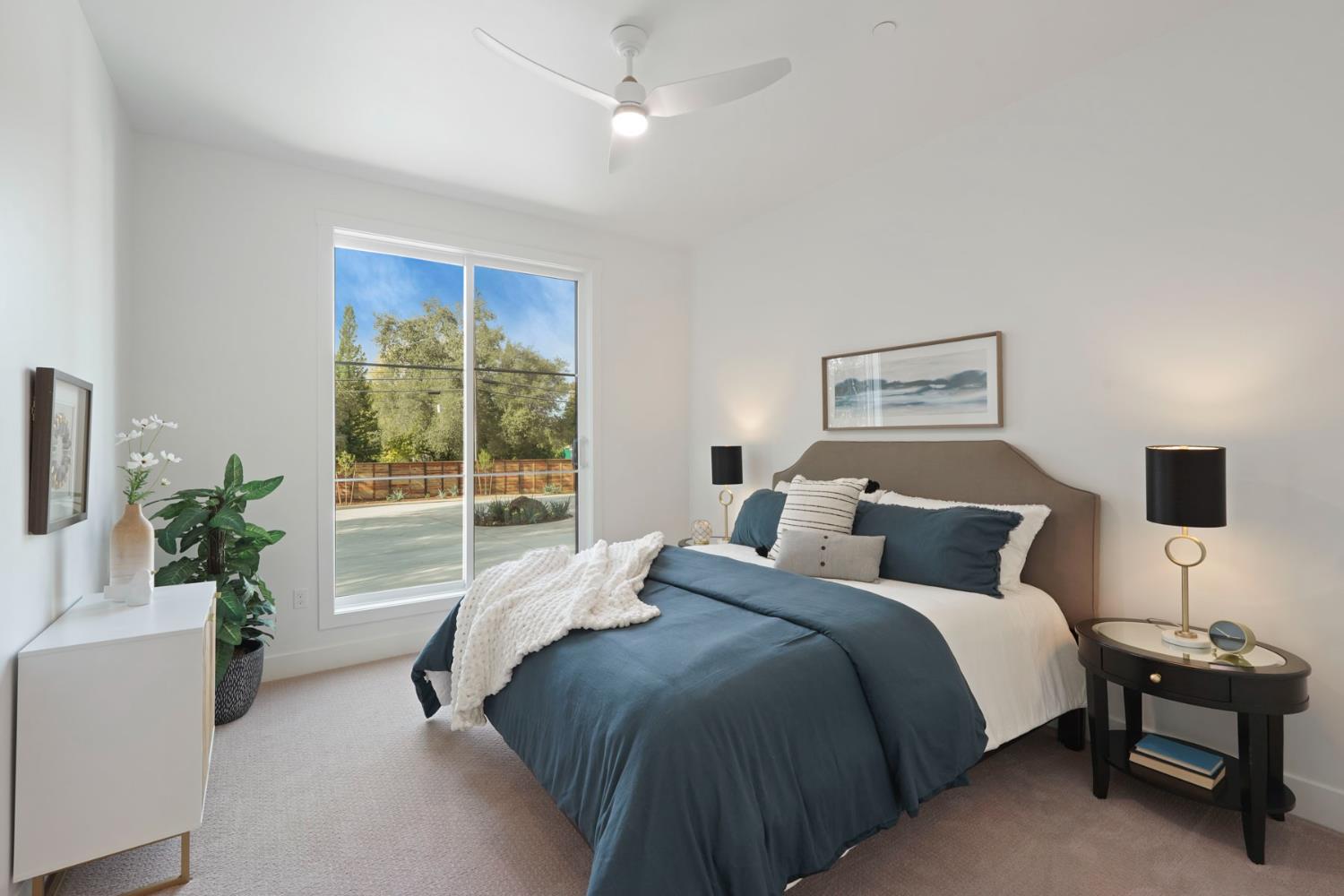 4177 Laird Road Loomis, CA 95650 - Photo 33 of 62 a spacious bedroom with a bed and a table