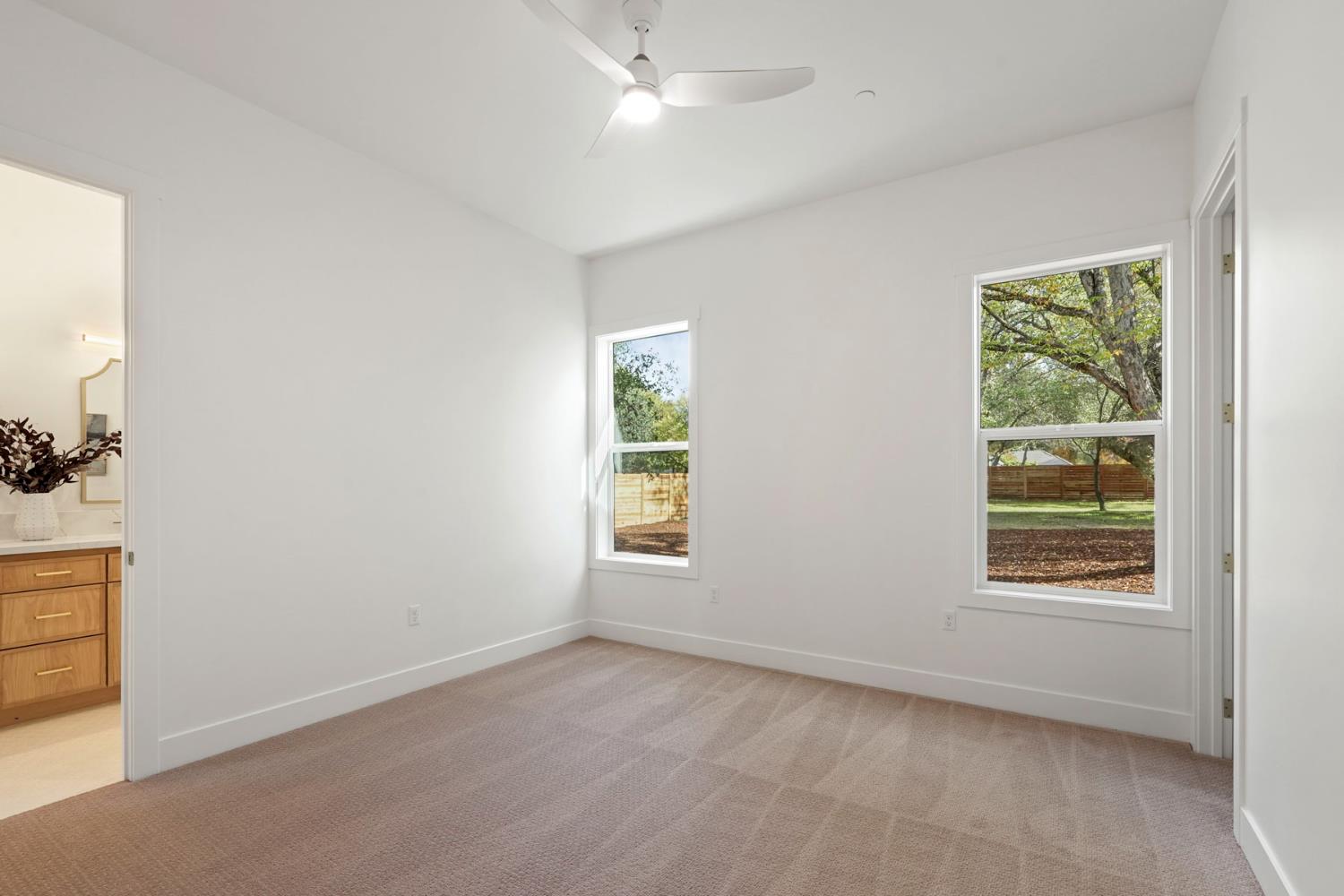 4177 Laird Road Loomis, CA 95650 - Photo 36 of 62 an empty room with windows and closet