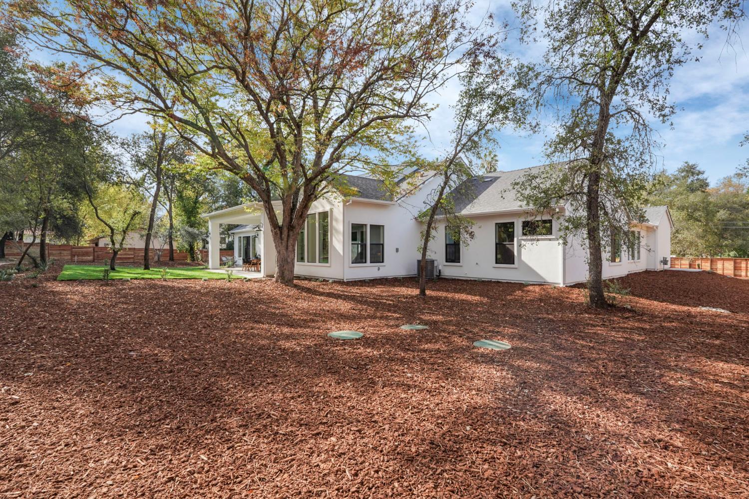 4177 Laird Road Loomis, CA 95650 - Photo 47 of 62 a view of a yard in front of a house with a large tree