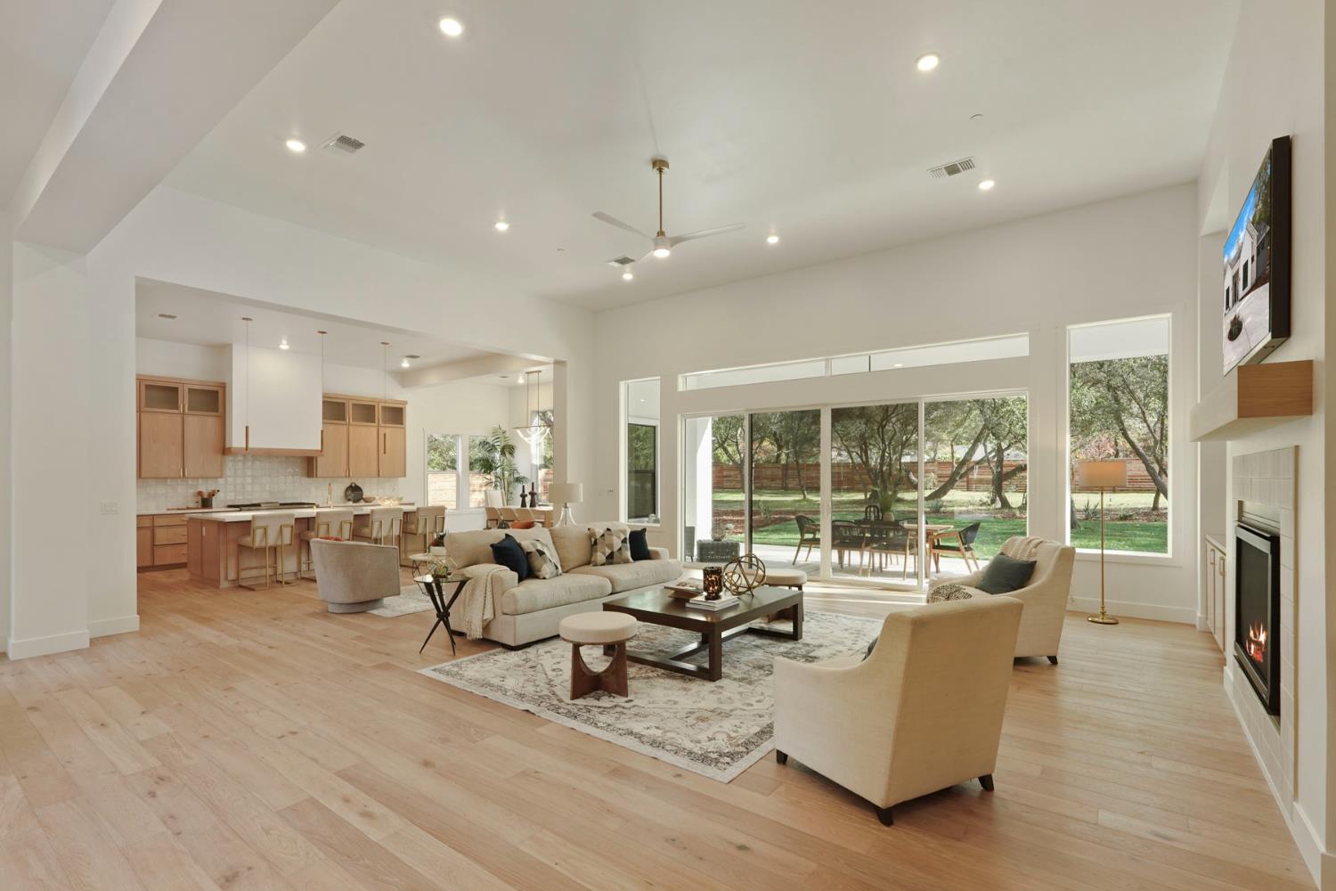 4177 Laird Road Loomis, CA 95650 - Photo 5 of 62 a living room with fireplace furniture and a flat screen tv