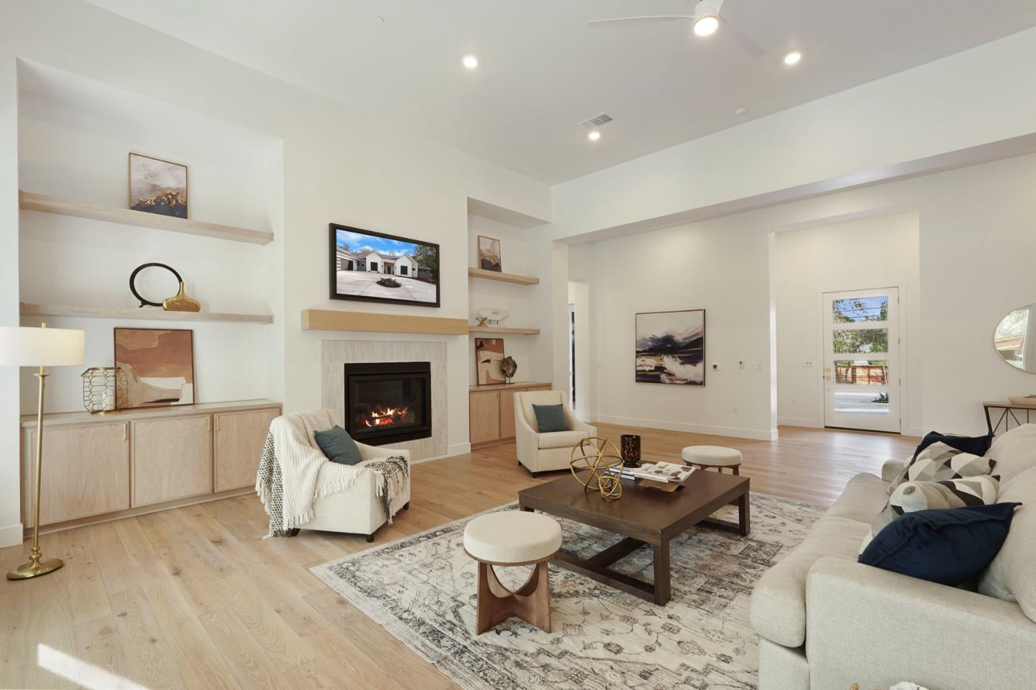 4177 Laird Road Loomis, CA 95650 - Photo 8 of 62 a living room with furniture a rug and a fireplace