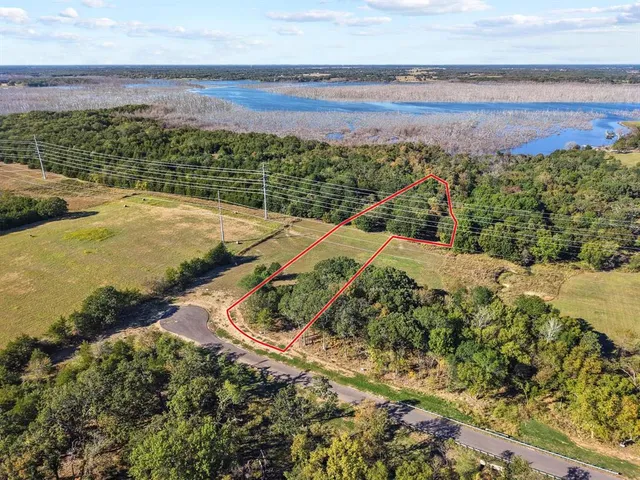 a view of a lake with beach and ocean view