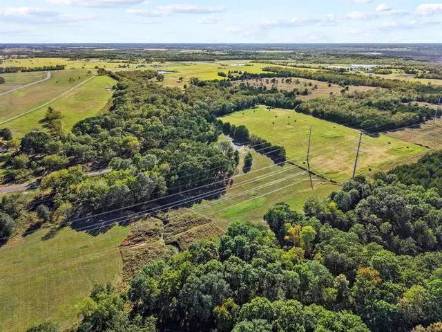 a view of an ocean and a mountain