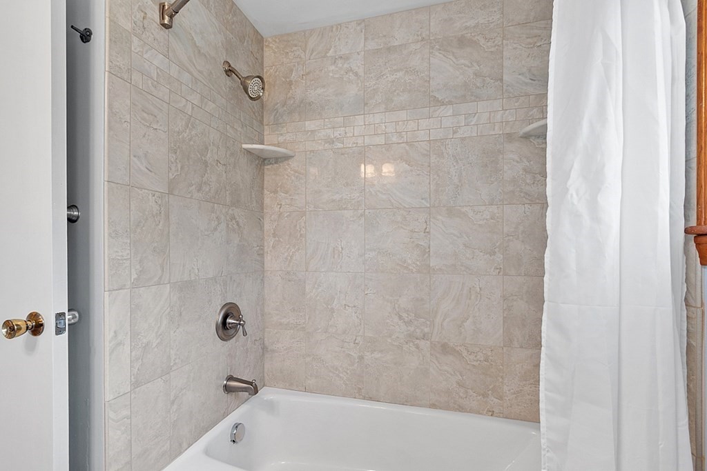 16 Winslow Road Chelmsford, MA 01824 - Photo 27 of 35 a bathroom with a bathtub