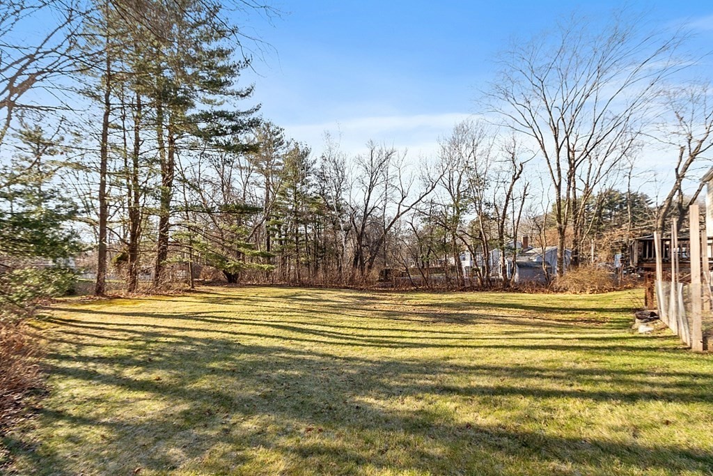 16 Winslow Road Chelmsford, MA 01824 - Photo 28 of 35 a view of a swimming pool with an outdoor space and seating area
