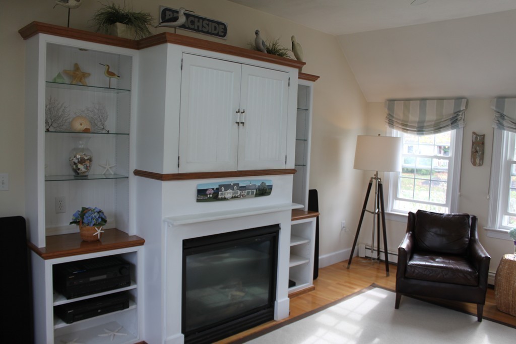 14 Brookline Road Scituate, MA 02066 - Photo 12 of 30 a living room with furniture and a fireplace