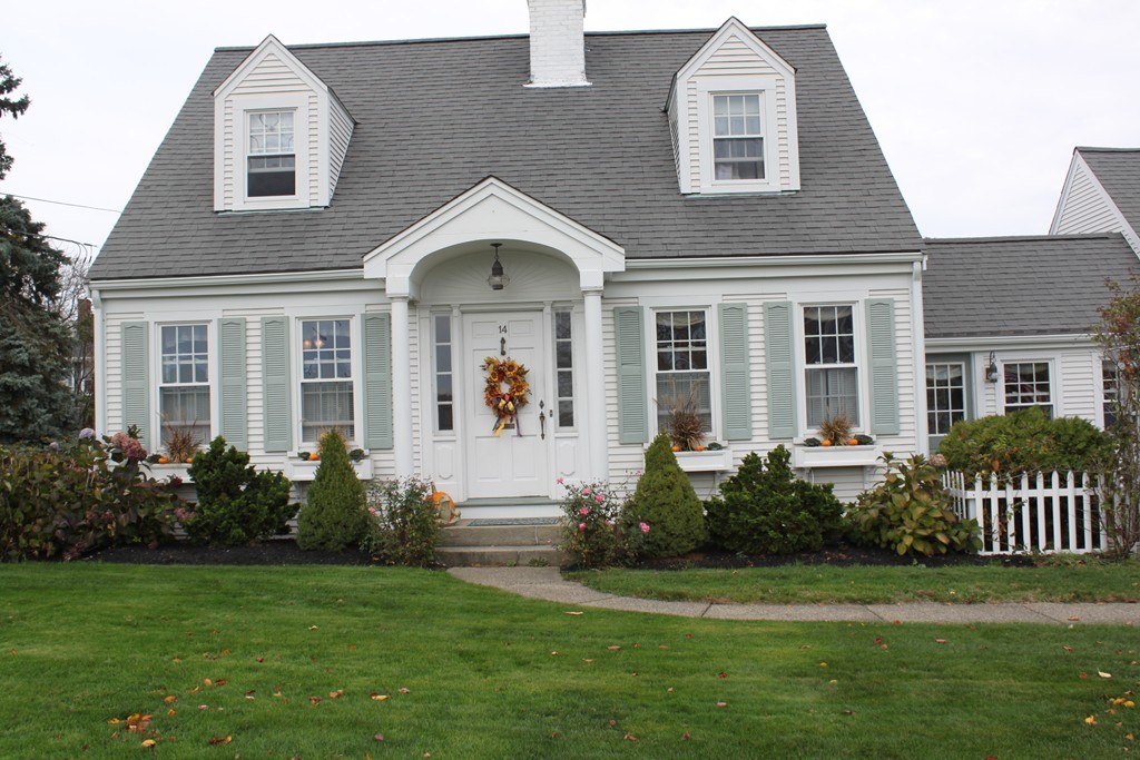 14 Brookline Road Scituate, MA 02066 - Photo 2 of 30 a front view of a house with a yard