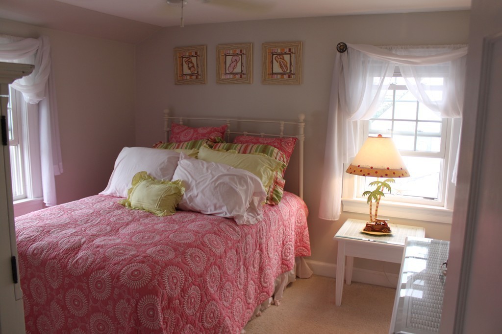 14 Brookline Road Scituate, MA 02066 - Photo 24 of 30 a bedroom with a bed and a window