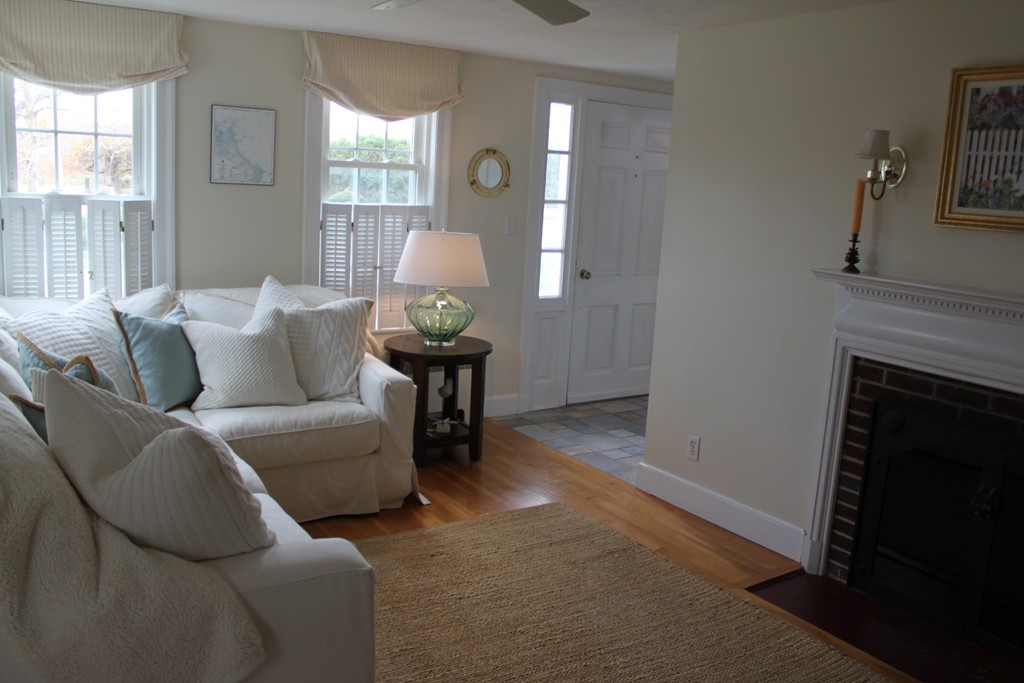 14 Brookline Road Scituate, MA 02066 - Photo 8 of 30 a living room with furniture and a fireplace