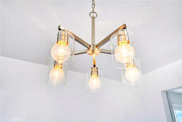 a bathroom with a sink a mirror and vanity