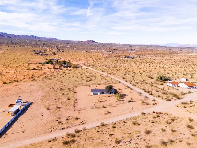 a view of ocean and mountain