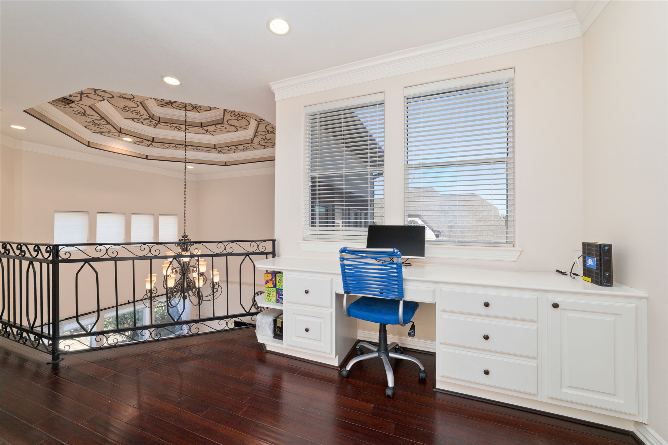 1126 Gardencrest Lane Houston, TX 77077 - Photo 18 of 31 a work room with furniture and wooden floor