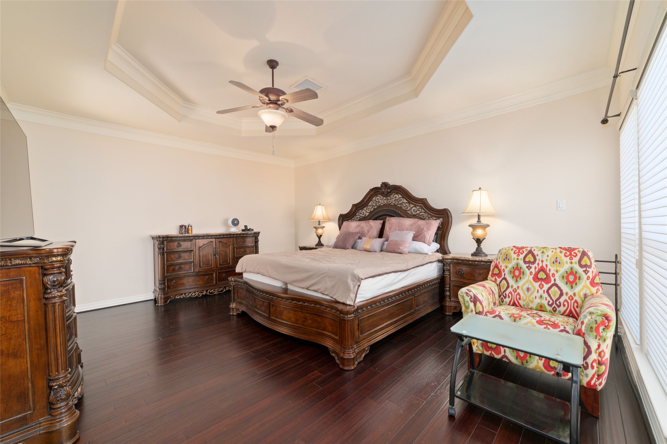 1126 Gardencrest Lane Houston, TX 77077 - Photo 20 of 31 a bedroom with a bed and a chandelier