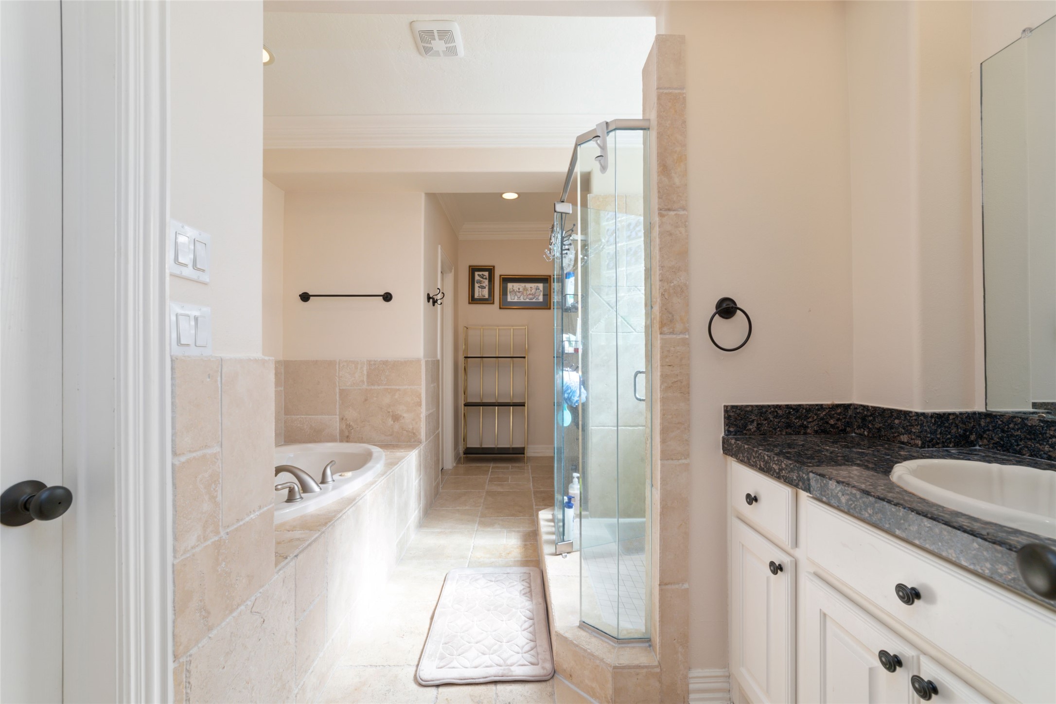 1126 Gardencrest Lane Houston, TX 77077 - Photo 22 of 31 a bathroom with a granite countertop sink mirror bathtub and shower