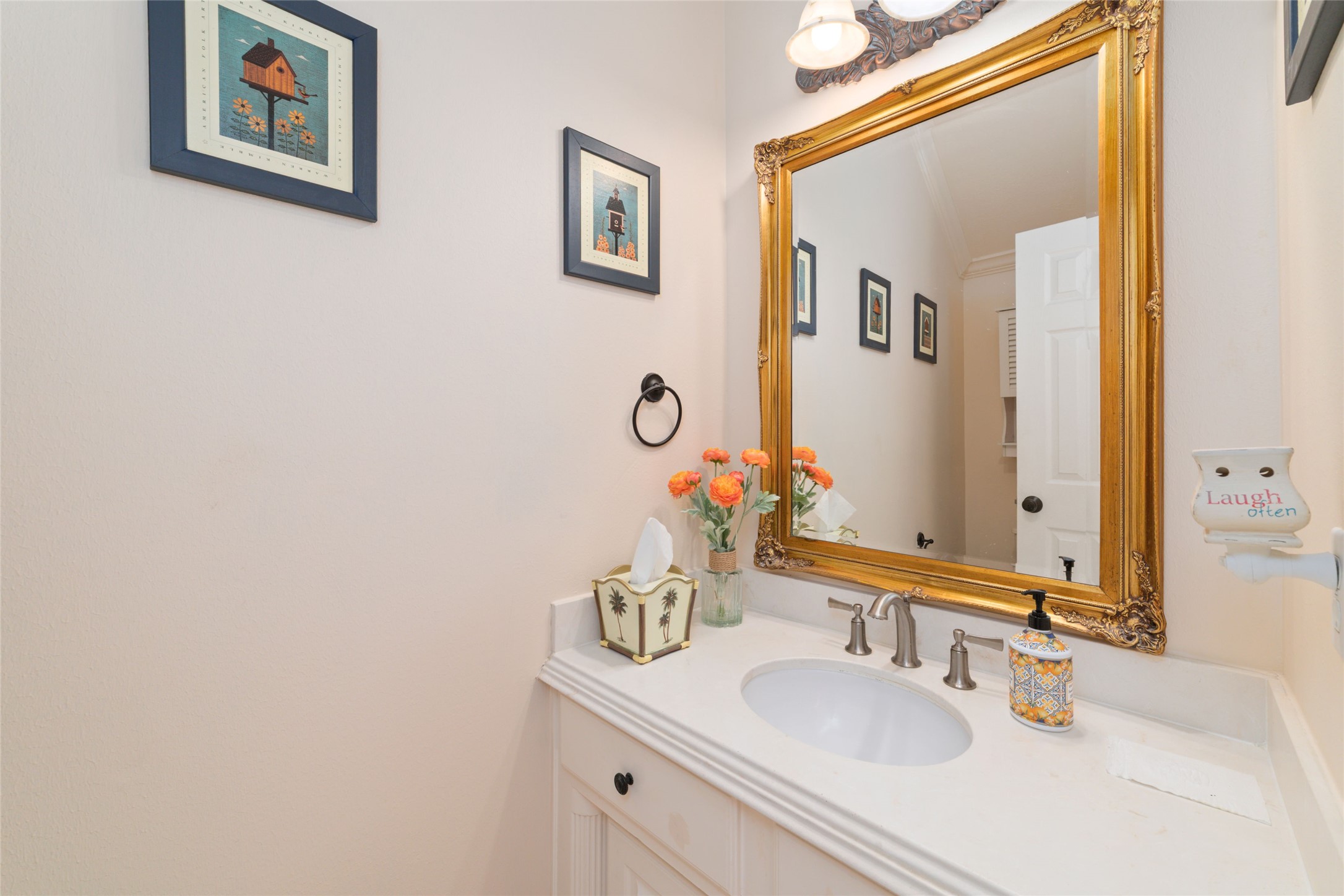 1126 Gardencrest Lane Houston, TX 77077 - Photo 26 of 31 a bathroom with a sink and a mirror