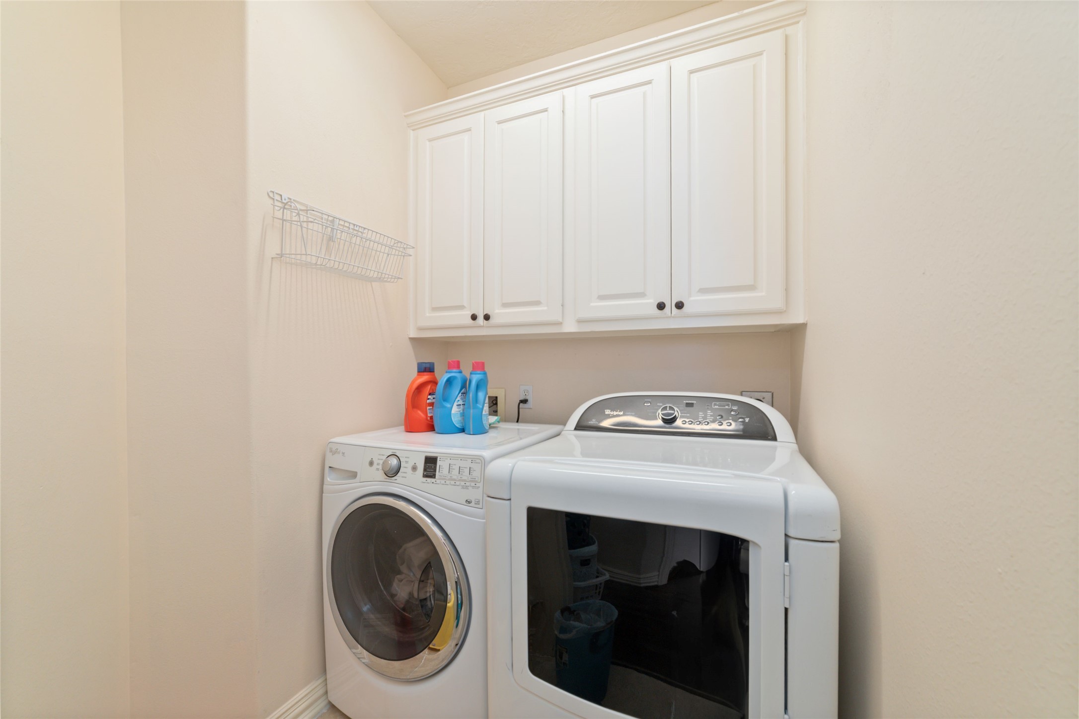 1126 Gardencrest Lane Houston, TX 77077 - Photo 28 of 31 a utility room with dryer and washer