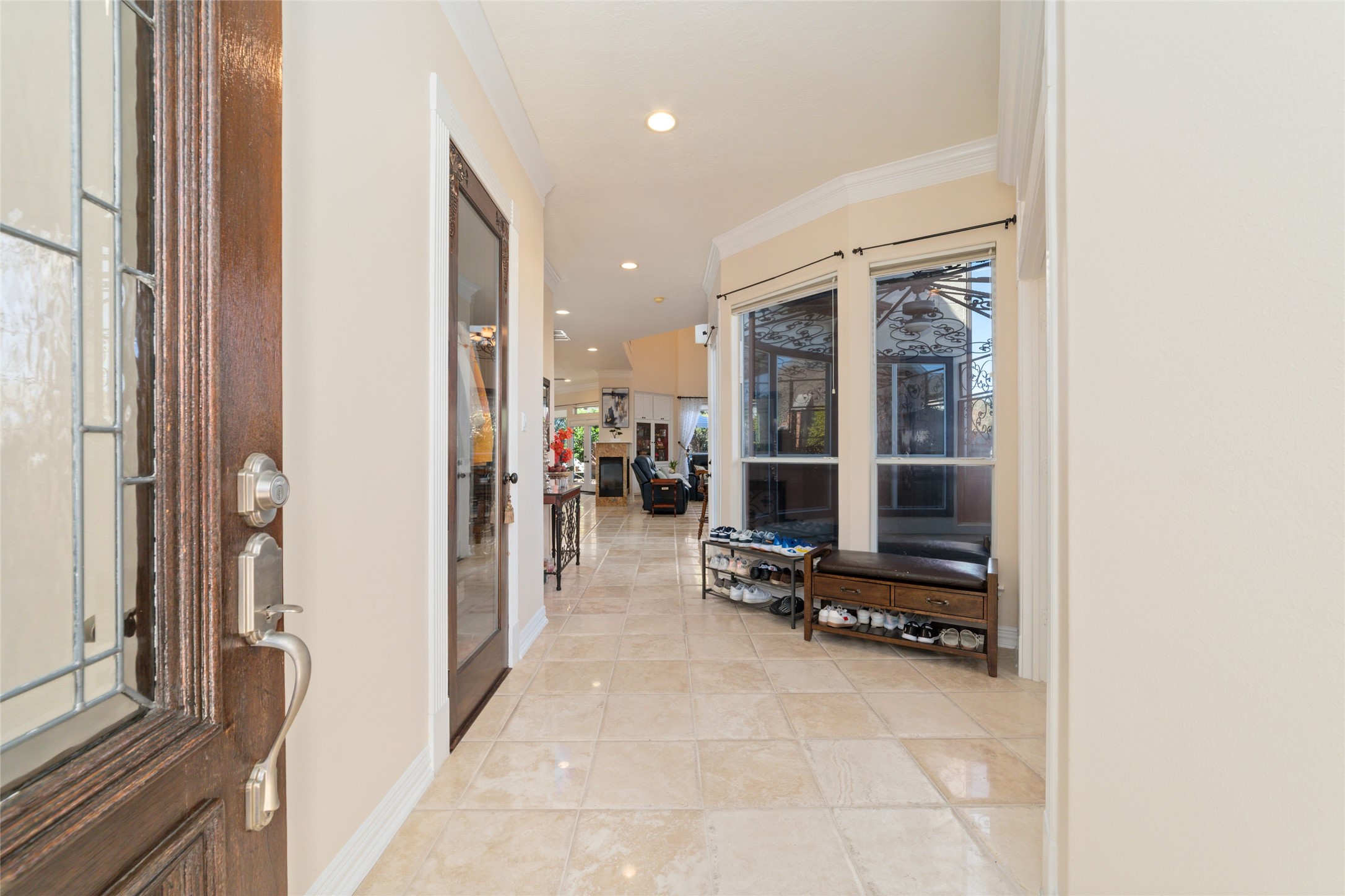 1126 Gardencrest Lane Houston, TX 77077 - Photo 5 of 31 a view of a hallway with living room and furniture