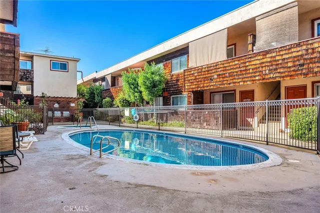 a view of a house with swimming pool