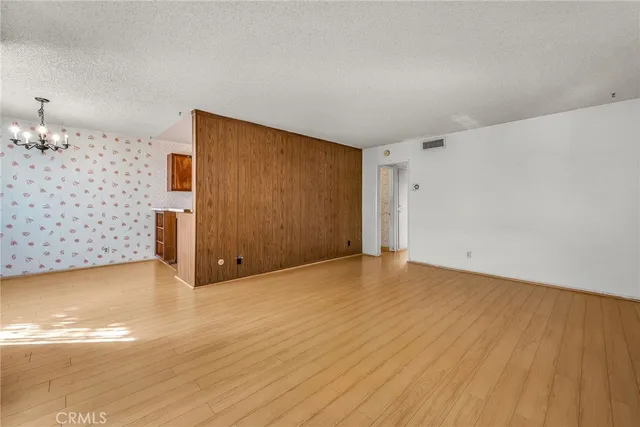a view of a livingroom with wooden floor