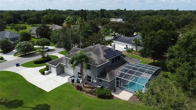 an aerial view of a house with a garden