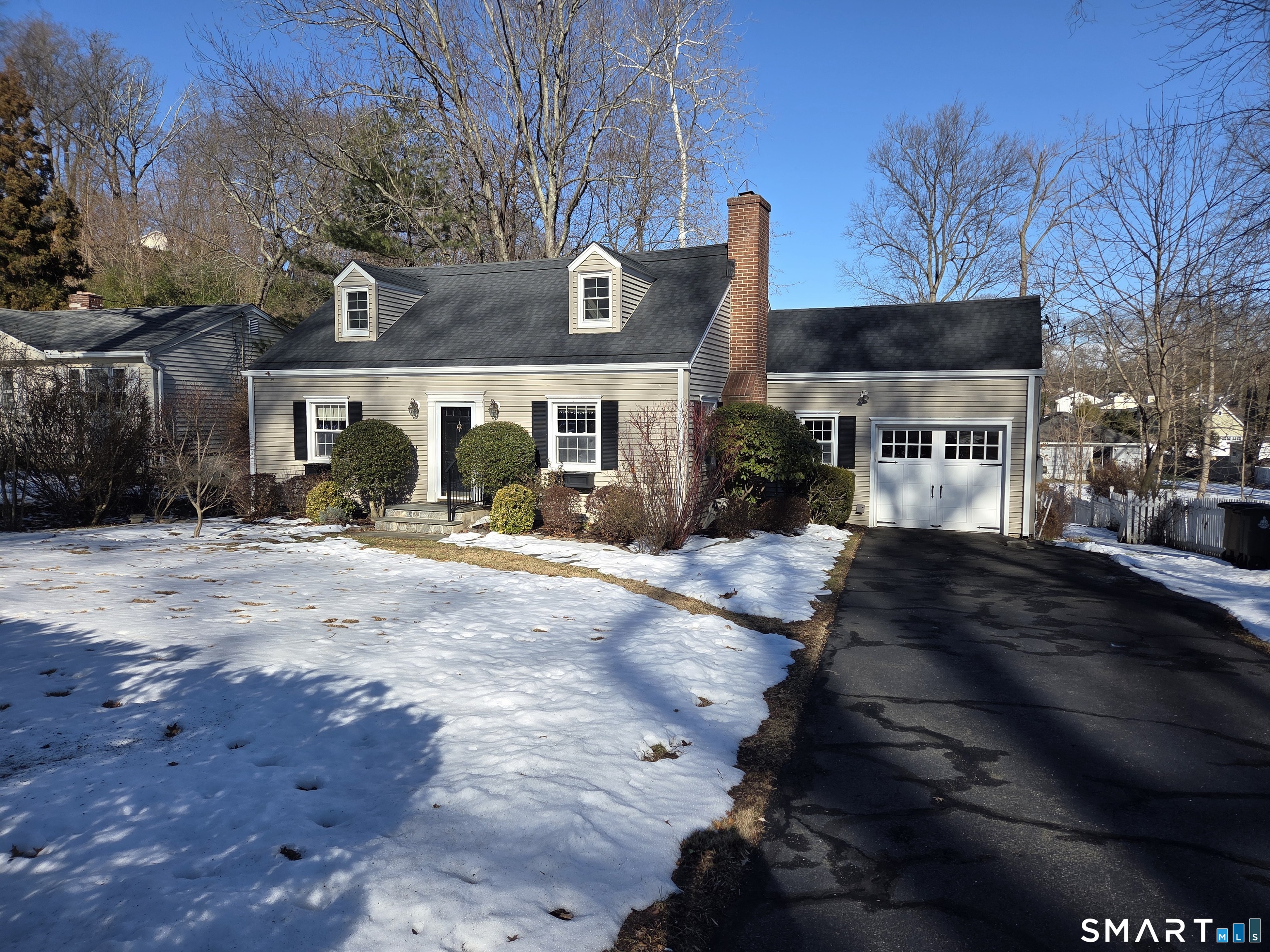 51 Glendale Road Stamford, CT 06905 - Photo 1 of 17 a view of a street with houses
