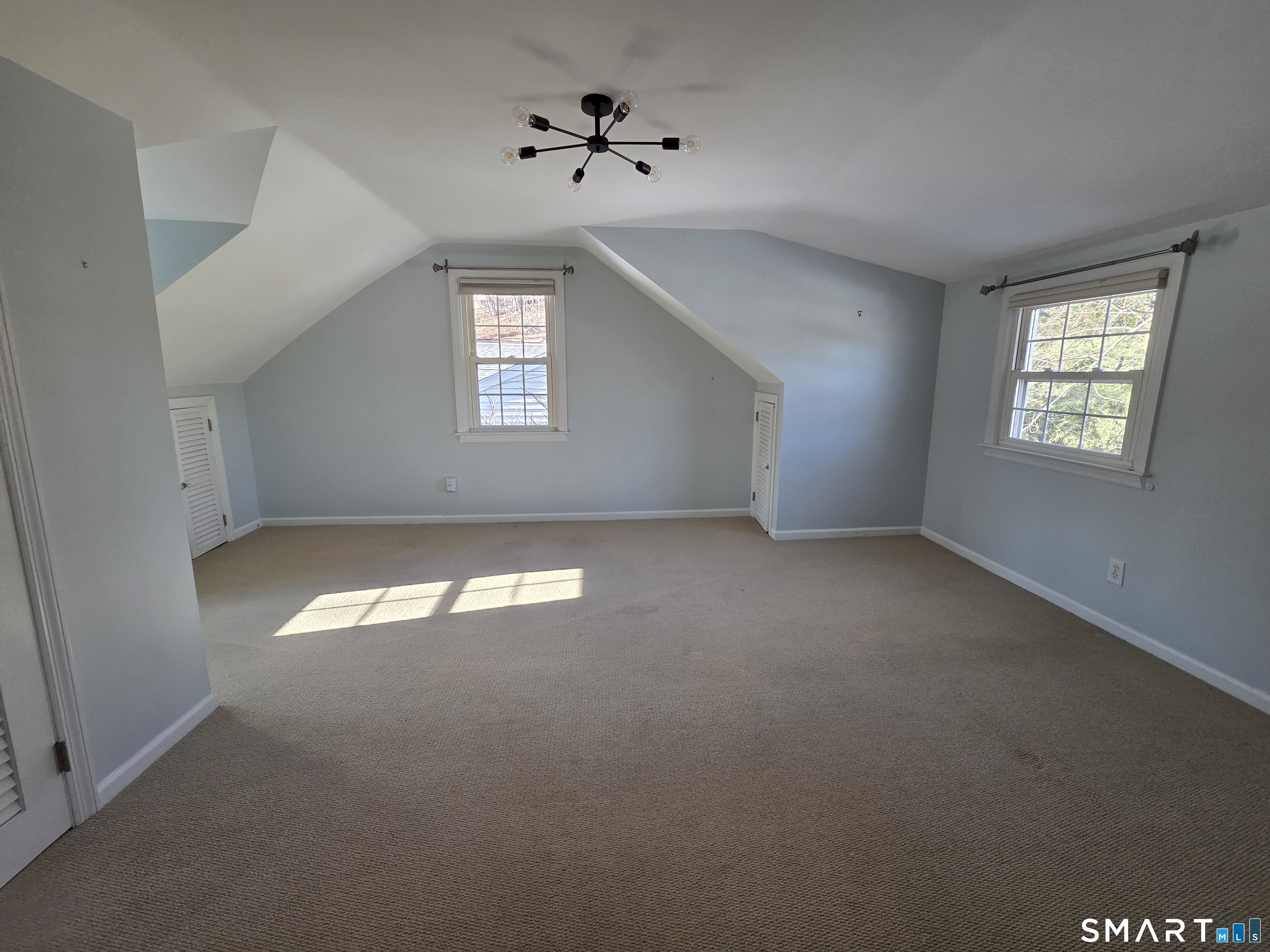 51 Glendale Road Stamford, CT 06905 - Photo 13 of 17 a view of empty room with a window