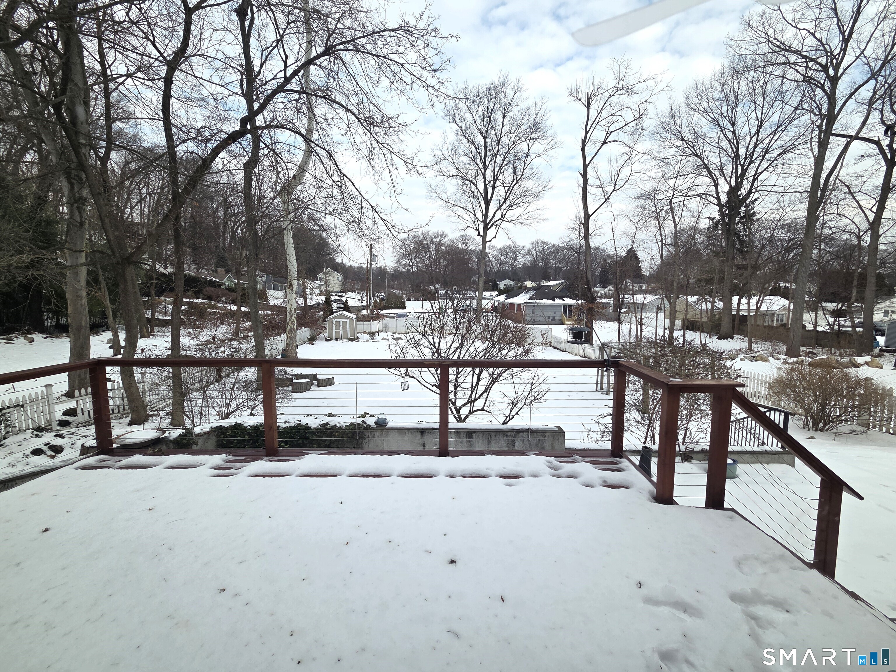 51 Glendale Road Stamford, CT 06905 - Photo 16 of 17 a view of a yard with wooden fence